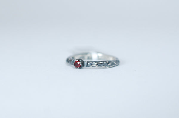 Oxidized silver stacking ring with Ruby. Designer jewellery.