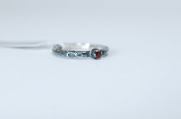 Oxidized silver stacking ring with Ruby. Designer jewellery.