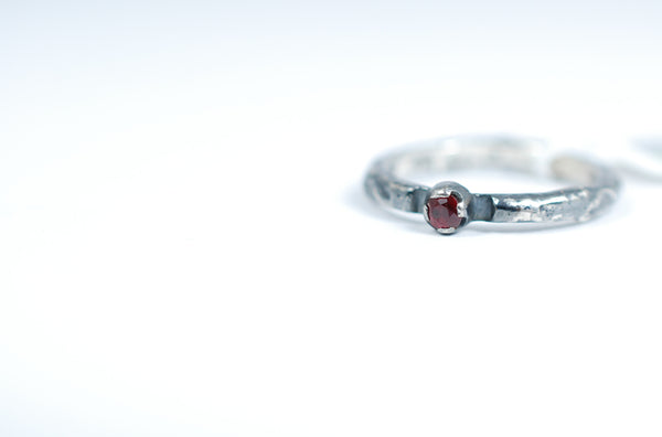 Oxidized silver stacking ring with Ruby. Designer jewellery.